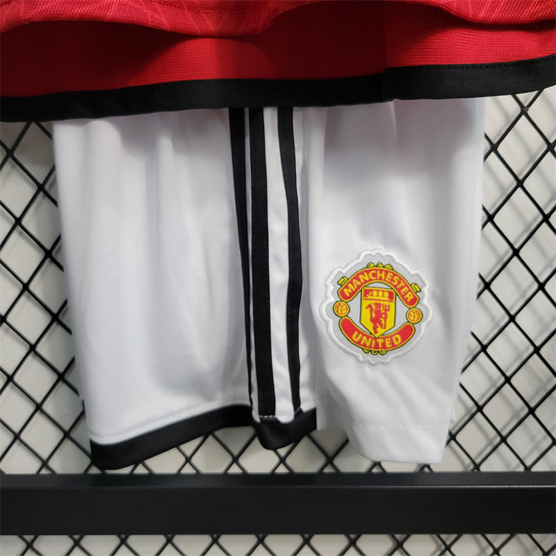 MANCHESTER UNITED - KIDS' HOME KIT 23/24