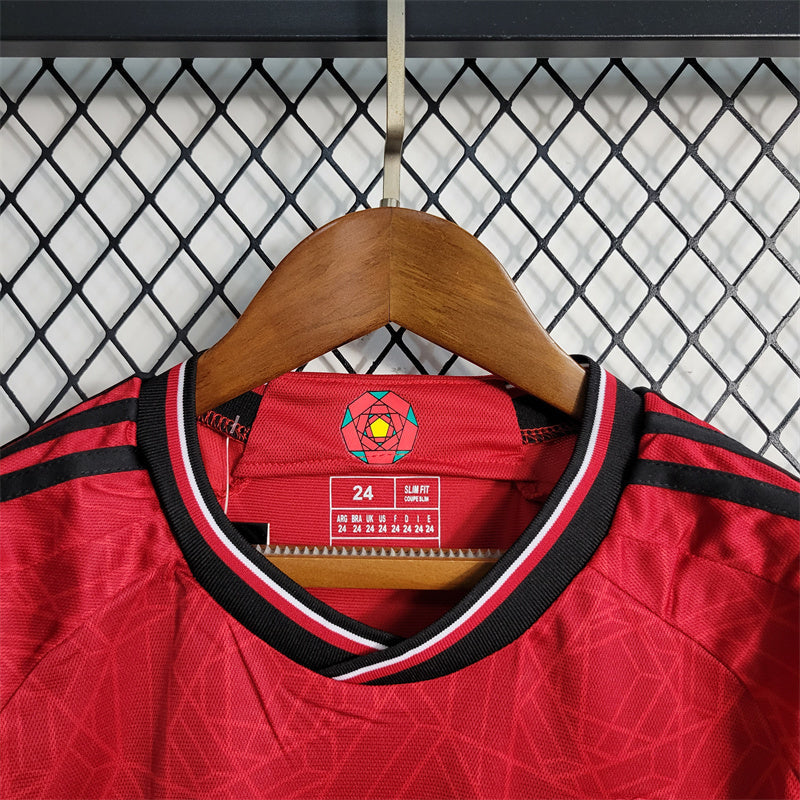 MANCHESTER UNITED - KIDS' HOME KIT 23/24