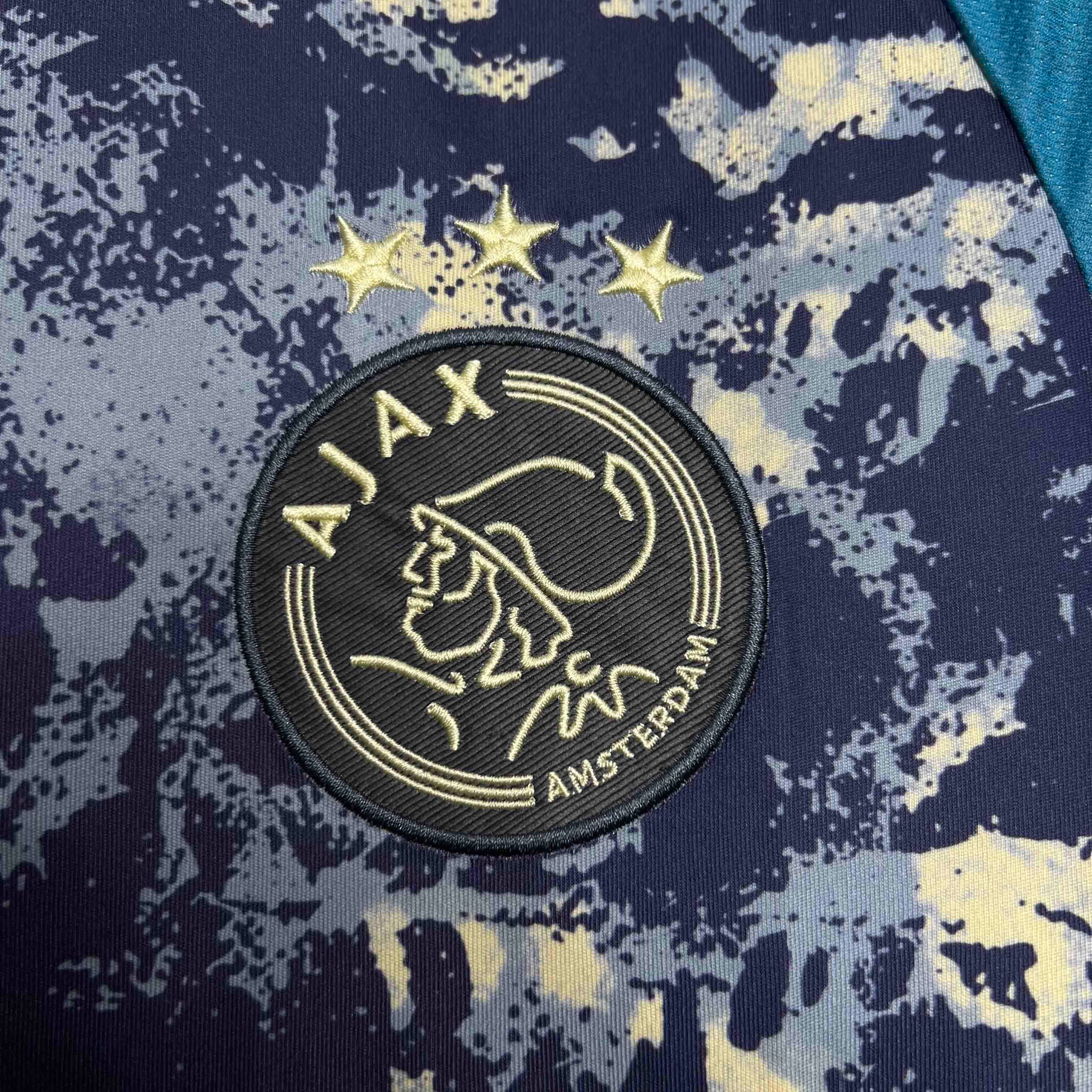 AJAX - MAILLOT EXTÉRIEUR 24/25