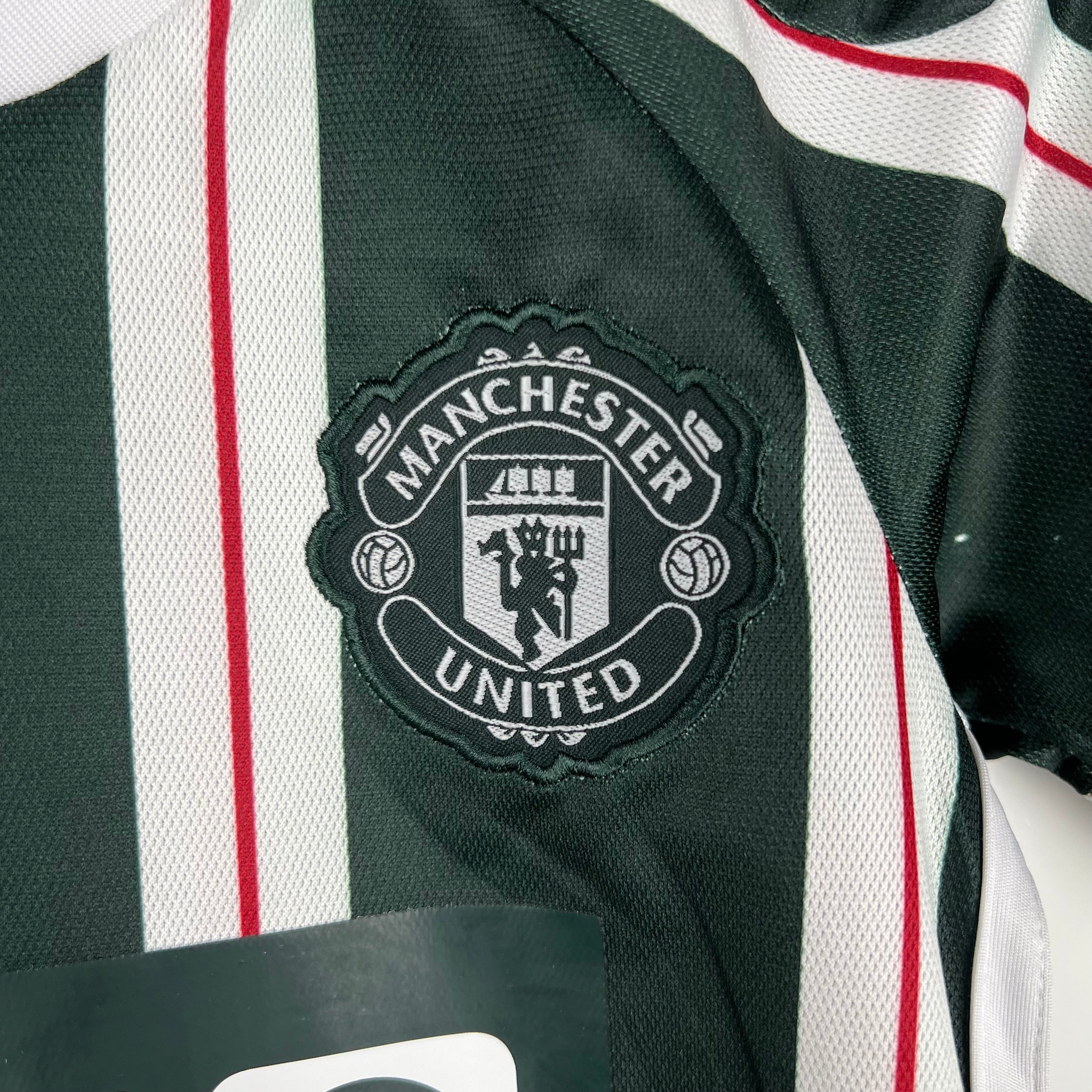 MANCHESTER UNITED - ENSEMBLE ENFANT EXTÉRIEUR 23/24