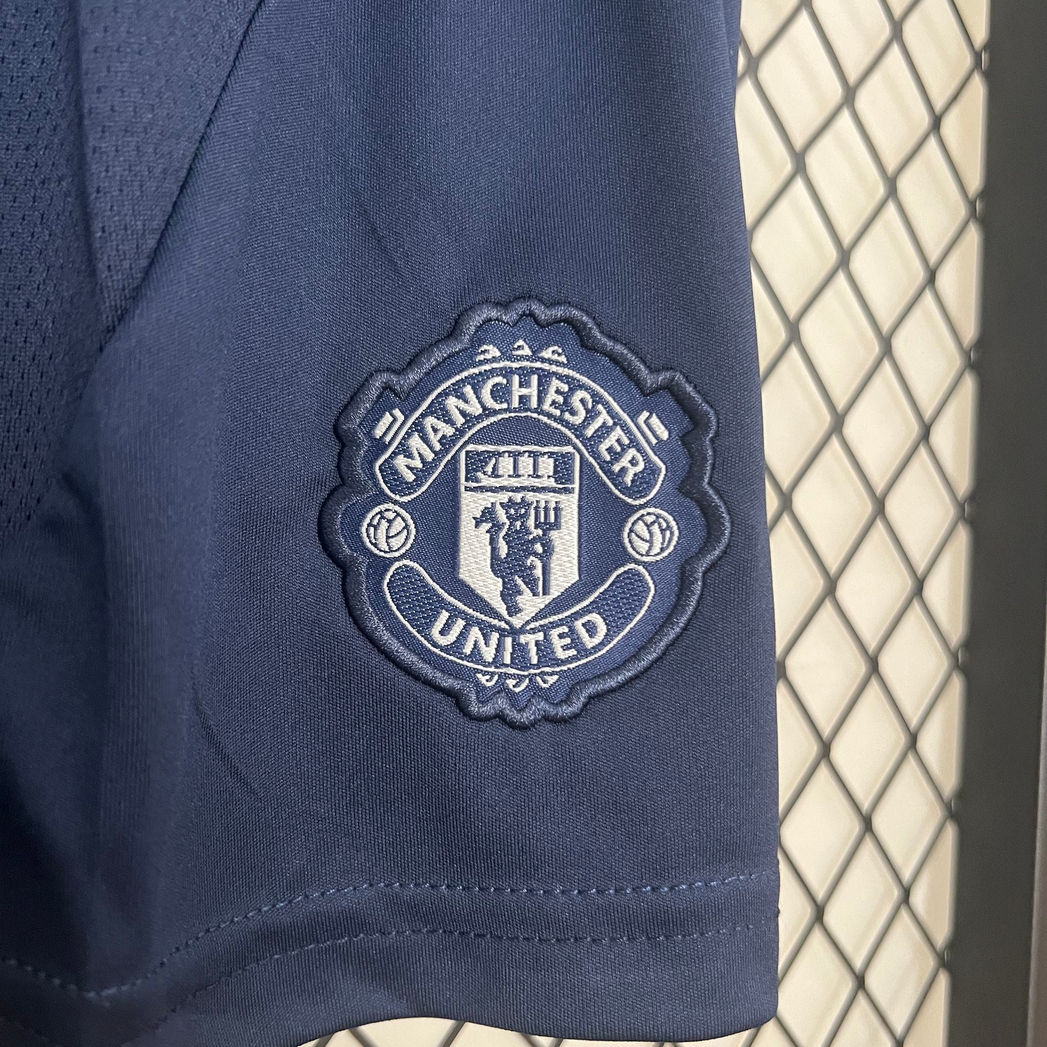 MANCHESTER UNITED - ENSEMBLE ENFANT EXTÉRIEUR 24/25