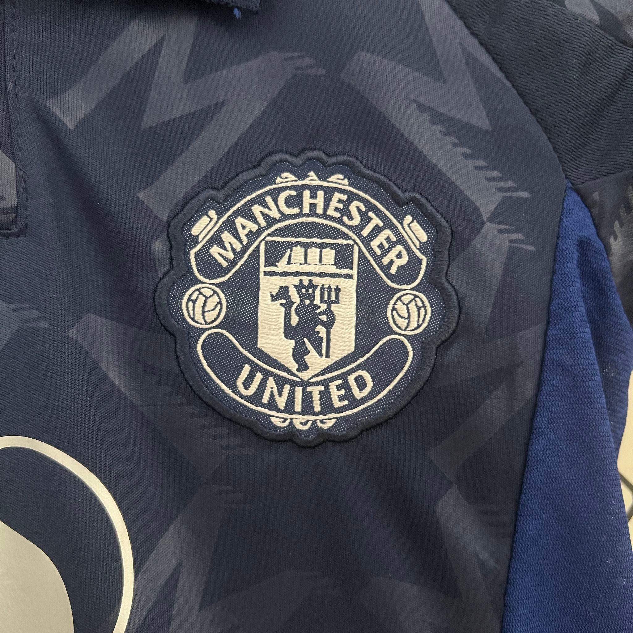 MANCHESTER UNITED - ENSEMBLE ENFANT EXTÉRIEUR 24/25